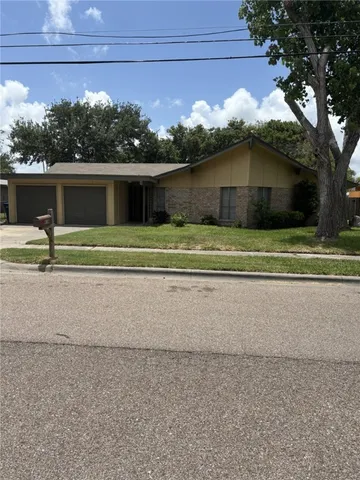 a house view with a outdoor space