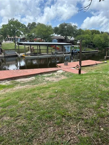 a view of a swimming pool with a lake view