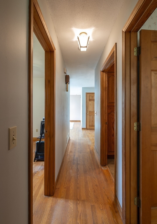 36 Gunn Road Southampton, MA 01073 - Photo 24 of 40 a view of hallway with wooden floor