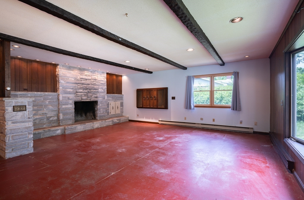 36 Gunn Road Southampton, MA 01073 - Photo 28 of 40 an empty room with windows and fireplace
