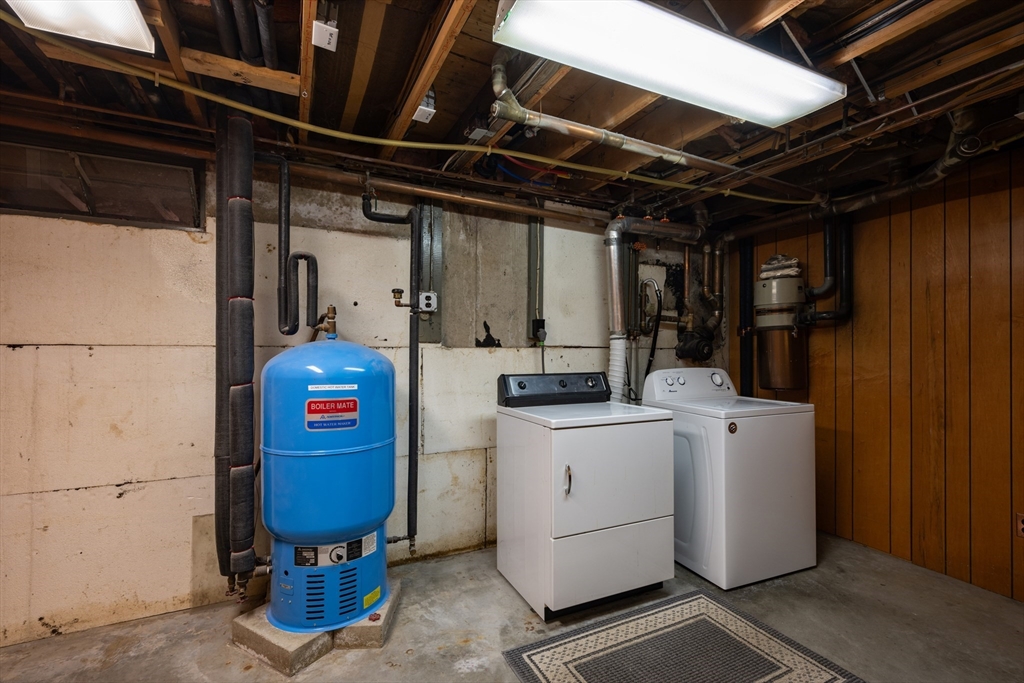 36 Gunn Road Southampton, MA 01073 - Photo 35 of 40 a utility room with dryer and washer