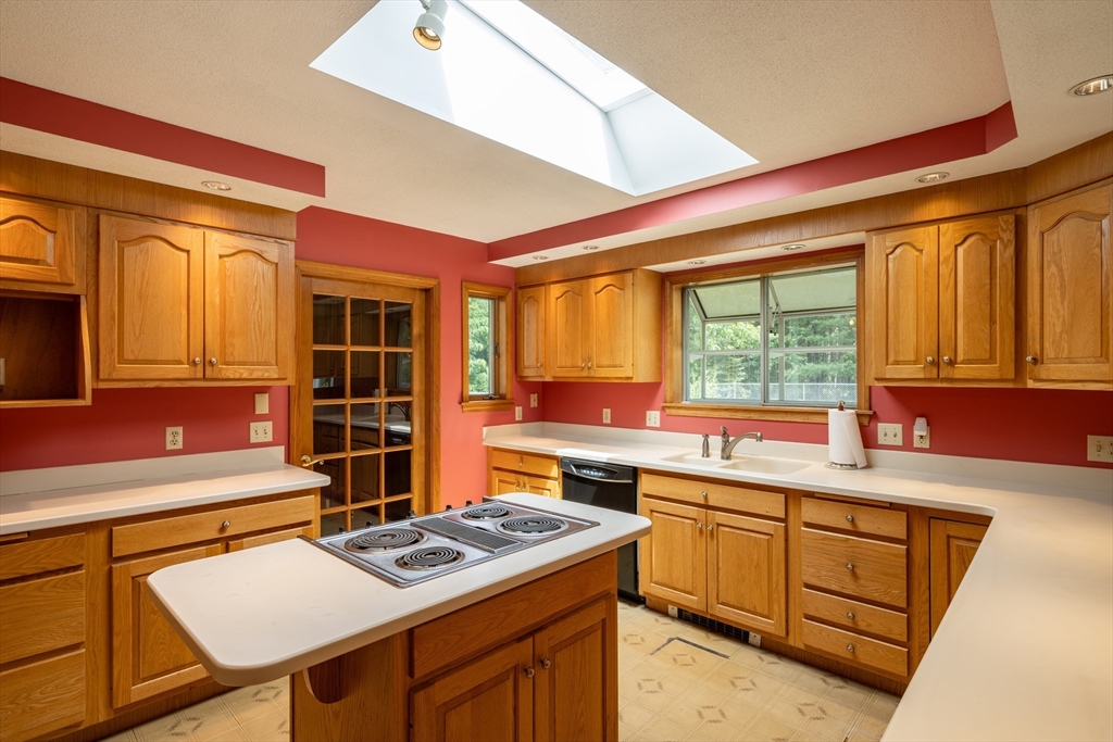 36 Gunn Road Southampton, MA 01073 - Photo 10 of 40 a kitchen with a stove a sink and a refrigerator