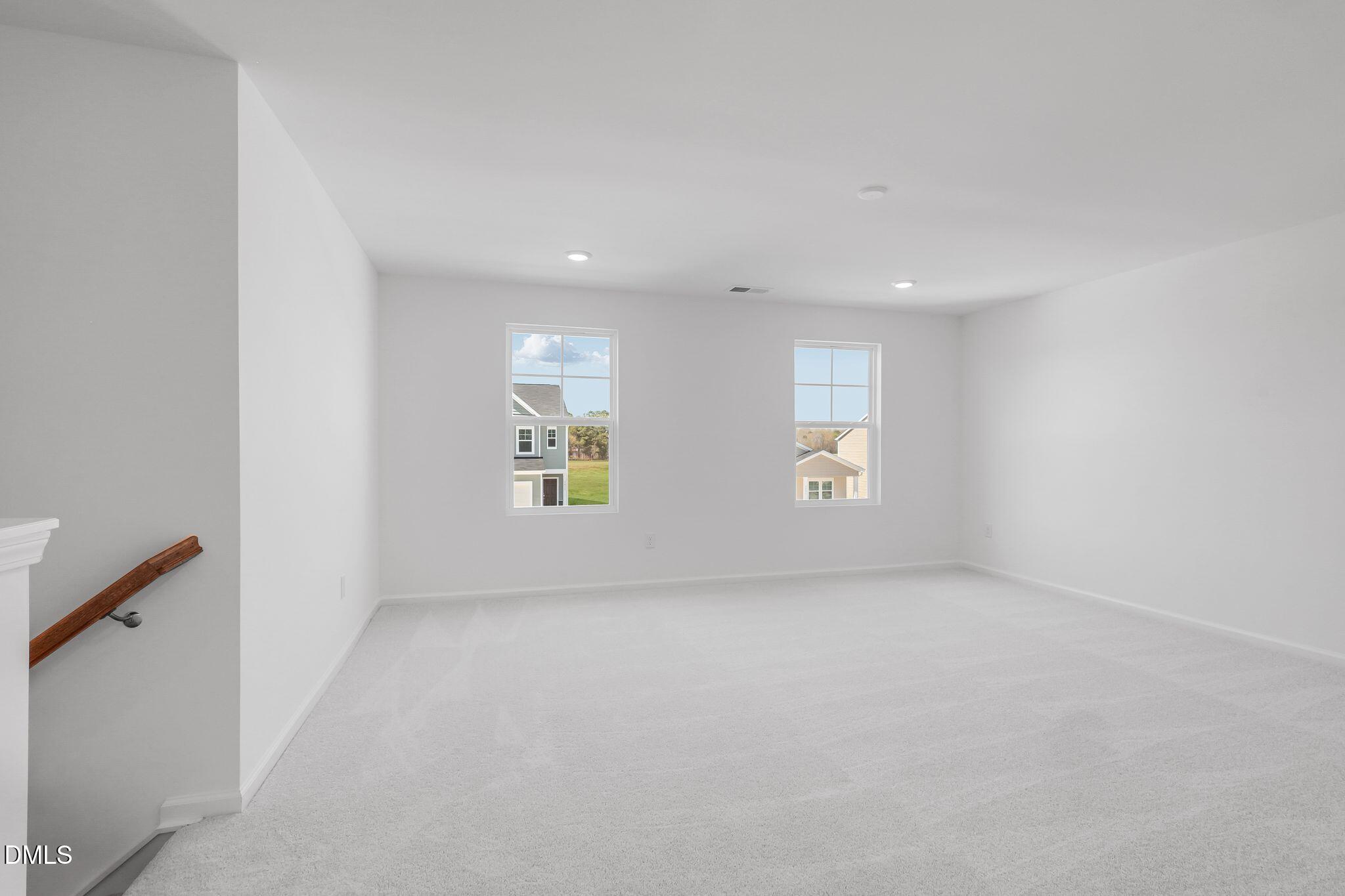 5818 Millstone Way Sims, NC 27880 - Photo 17 of 24 an empty room with windows