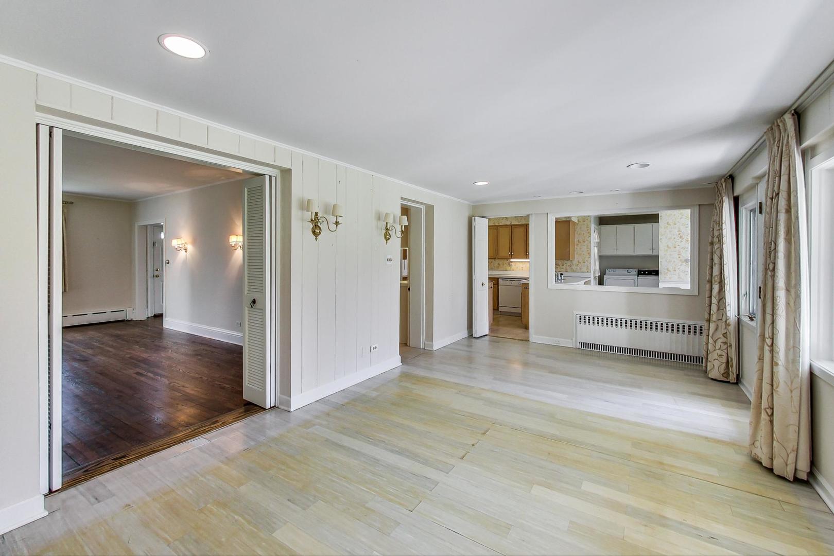 22 Timber Lane Northbrook, IL 60062 - Photo 14 of 41 view of livingroom with hardwood floor and window