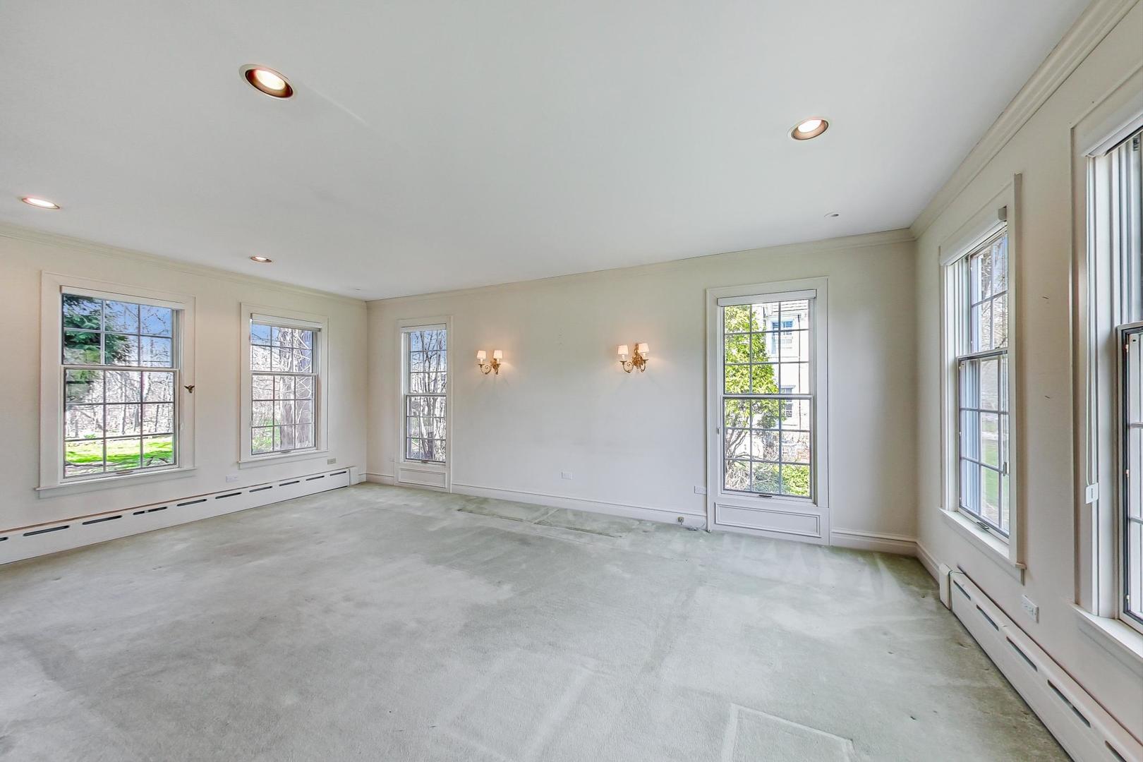 22 Timber Lane Northbrook, IL 60062 - Photo 6 of 41 a view of an empty room with a window