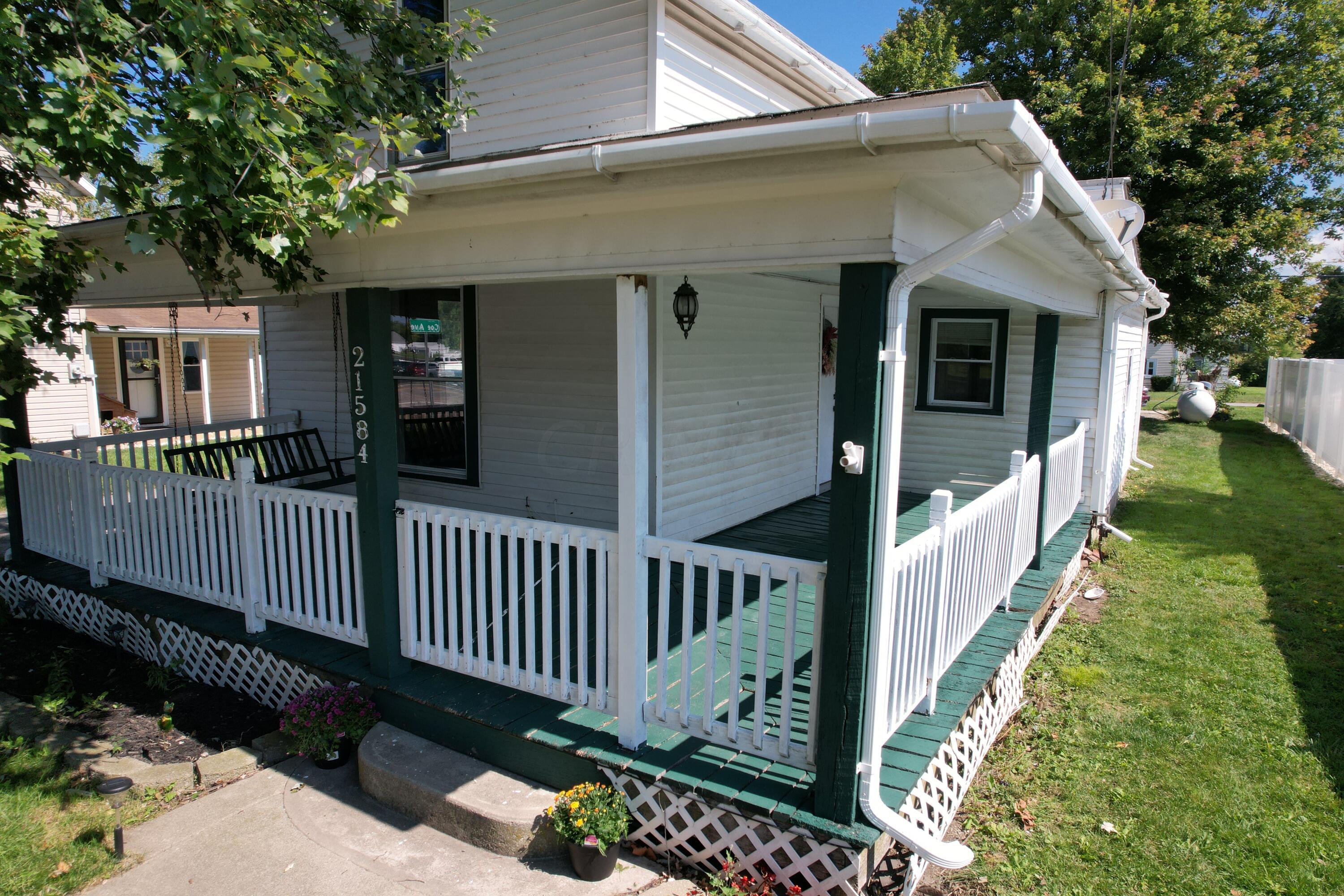 21584 Main Street Raymond, OH 43067 - Photo 4 of 40 Beautiful wrap around porch with gate