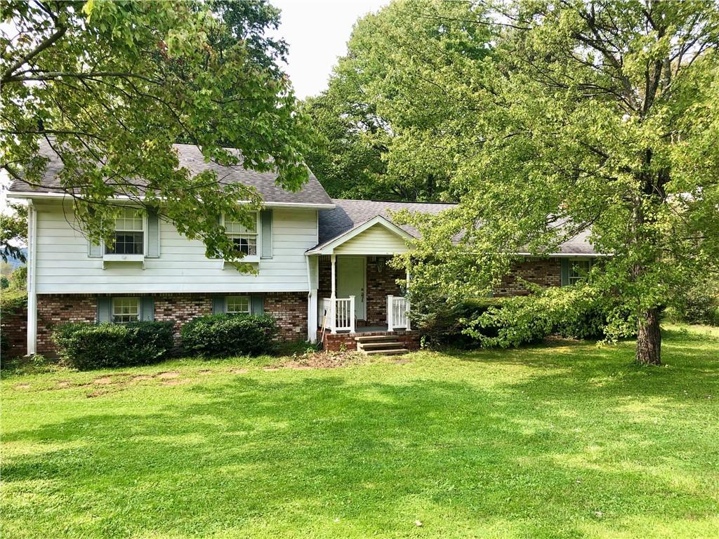 719 Zehner Road Indiana, PA 15701 - Photo 1 of 14 a view of a house with a yard and sitting area