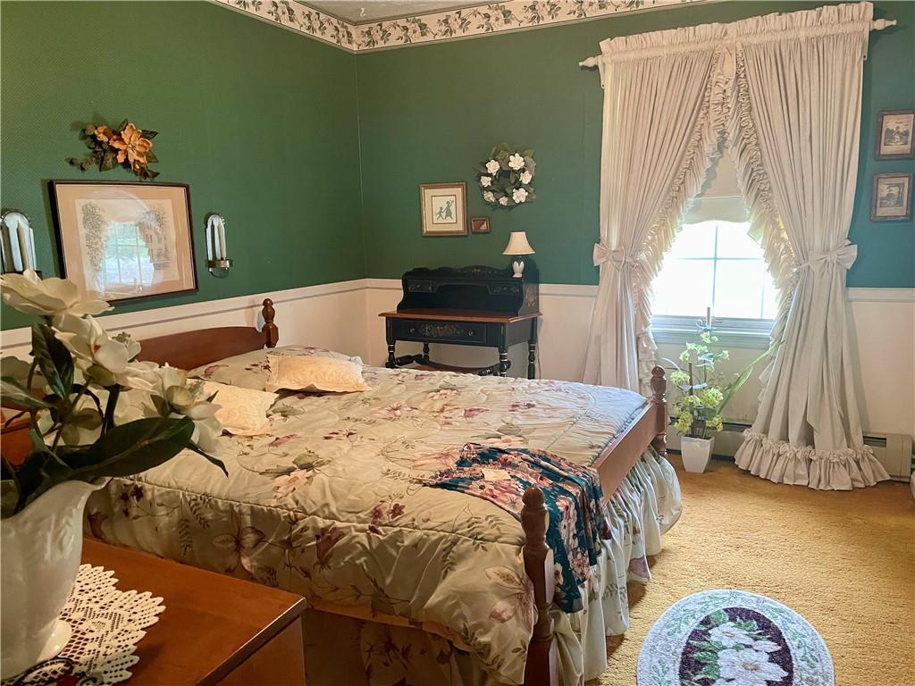 719 Zehner Road Indiana, PA 15701 - Photo 11 of 14 a bed sitting in a bedroom next to a window