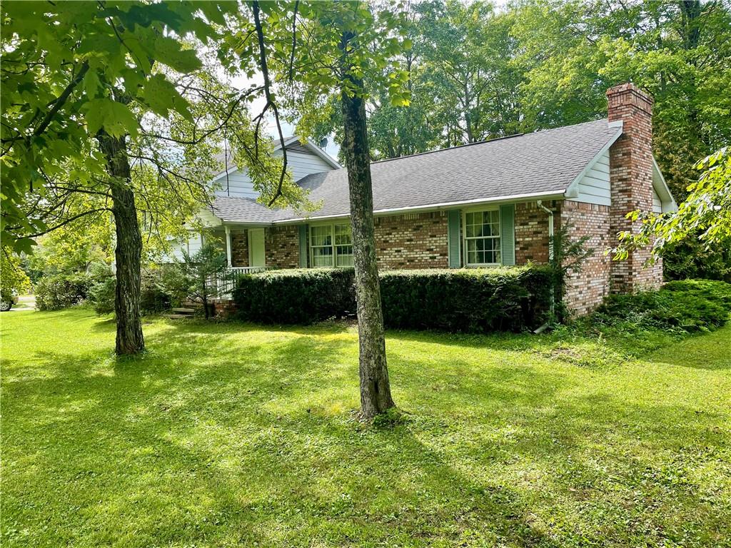 719 Zehner Road Indiana, PA 15701 - Photo 4 of 14 a view of a house with a garden