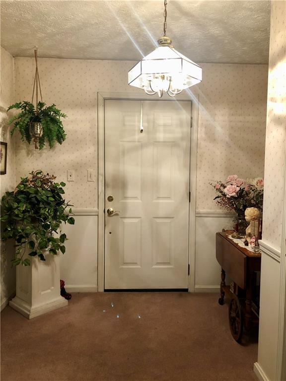 719 Zehner Road Indiana, PA 15701 - Photo 9 of 14 a view of a room with a chandelier