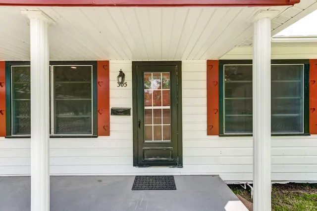 a front view of a house with a window
