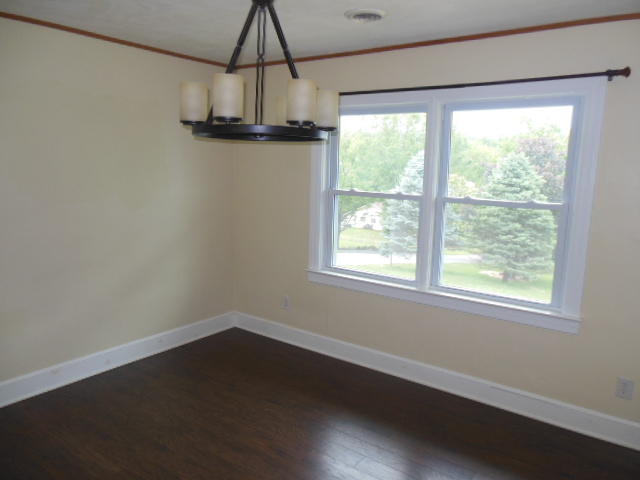 4645 Grandin Road Southwest Roanoke, VA 24018 - Photo 5 of 23 a view of a room with wooden floor and windows