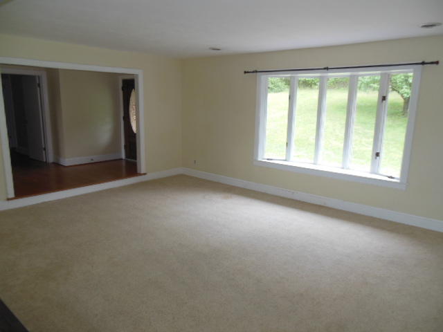 4645 Grandin Road Southwest Roanoke, VA 24018 - Photo 6 of 23 an empty room with a window