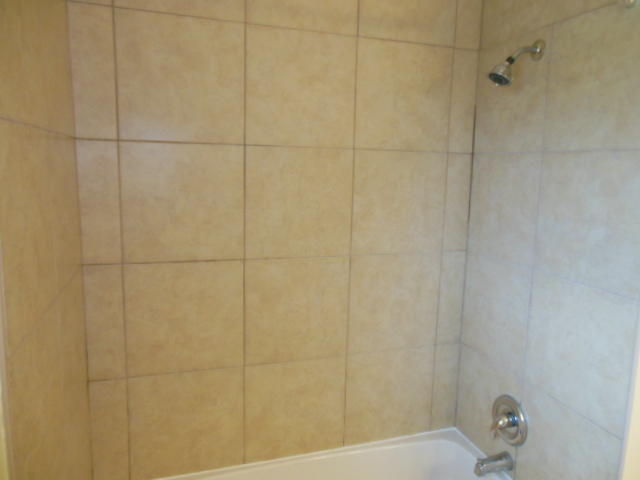 4645 Grandin Road Southwest Roanoke, VA 24018 - Photo 10 of 23 a bathroom with a bathtub