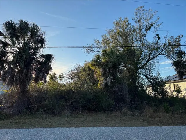 a view of a street with a building in the background