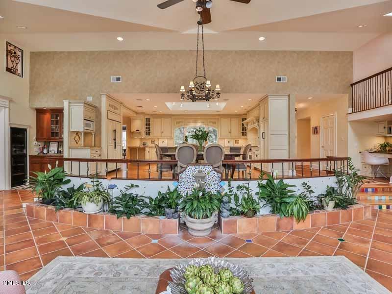 385 Middlesex Road Darien, CT 06820 - Photo 11 of 28 a very nice looking room with a large window and chandelier