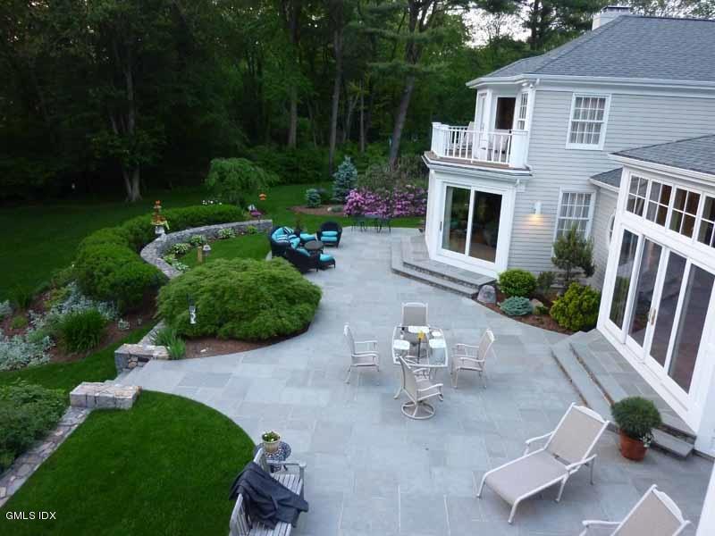385 Middlesex Road Darien, CT 06820 - Photo 23 of 28 a view of backyard with outdoor seating and green space