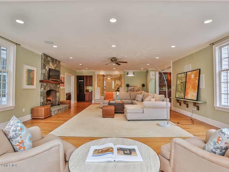 385 Middlesex Road Darien, CT 06820 - Photo 5 of 28 a living room with furniture and a large window