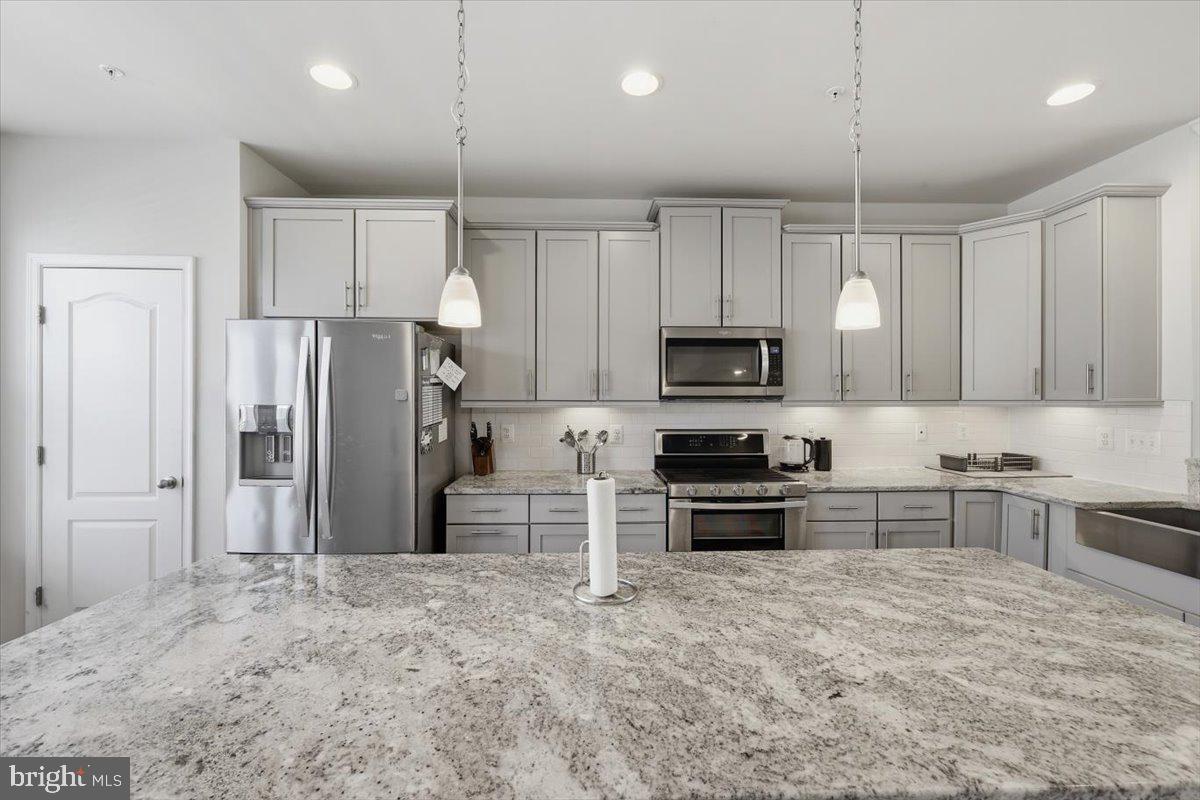 1833 Clancy Avenue Frederick, MD 21702 - Photo 7 of 43 Modern kitchen with sleek finishes.