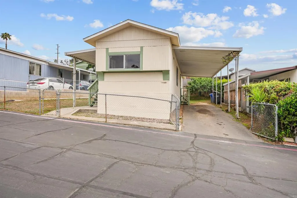 1455 Alturas Street, Unit 41 Fallbrook, CA 92028 - Photo 14 of 52 a view of house with backyard and sitting area