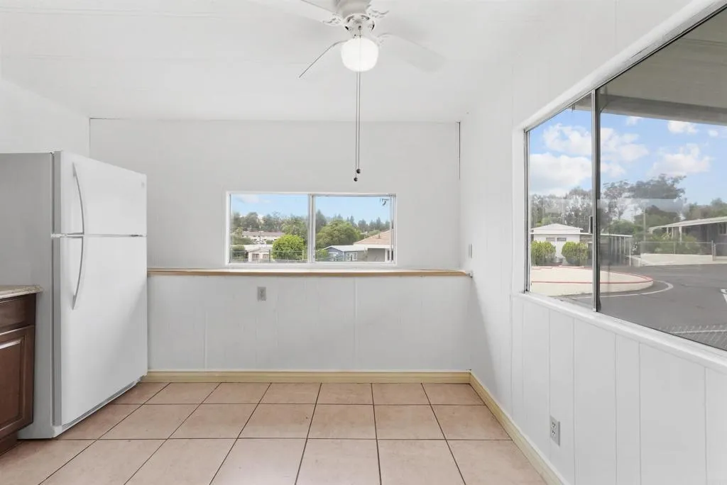 1455 Alturas Street, Unit 41 Fallbrook, CA 92028 - Photo 27 of 52 a view of an empty room with a window