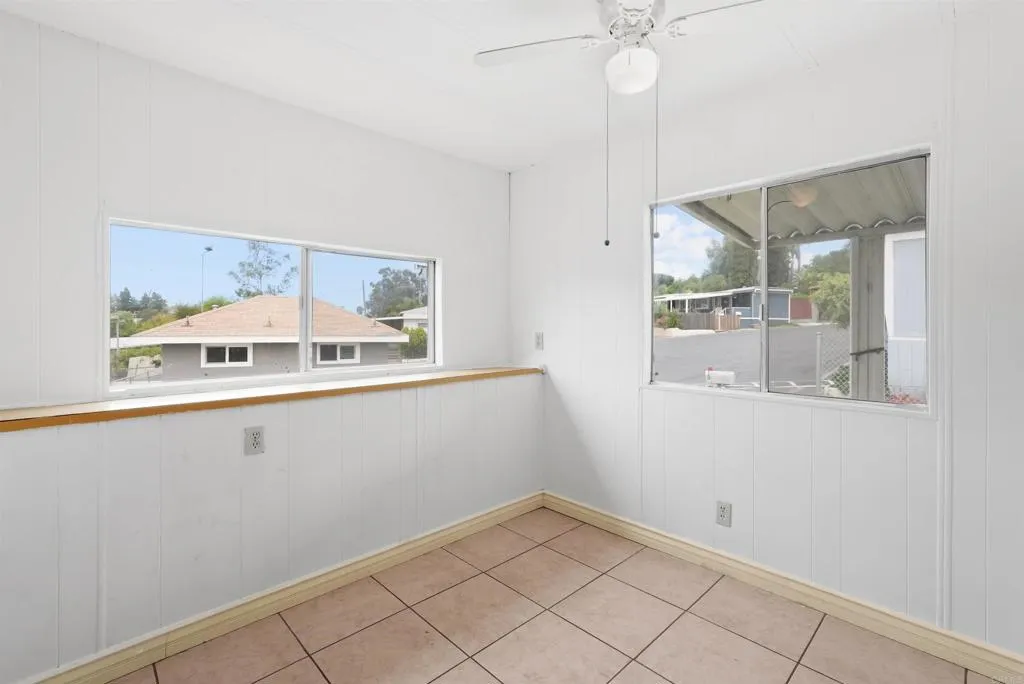1455 Alturas Street, Unit 41 Fallbrook, CA 92028 - Photo 28 of 52 a view of an empty room with a window