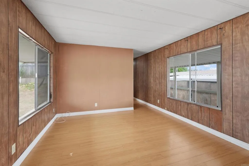 1455 Alturas Street, Unit 41 Fallbrook, CA 92028 - Photo 30 of 52 a view of an empty room with a window