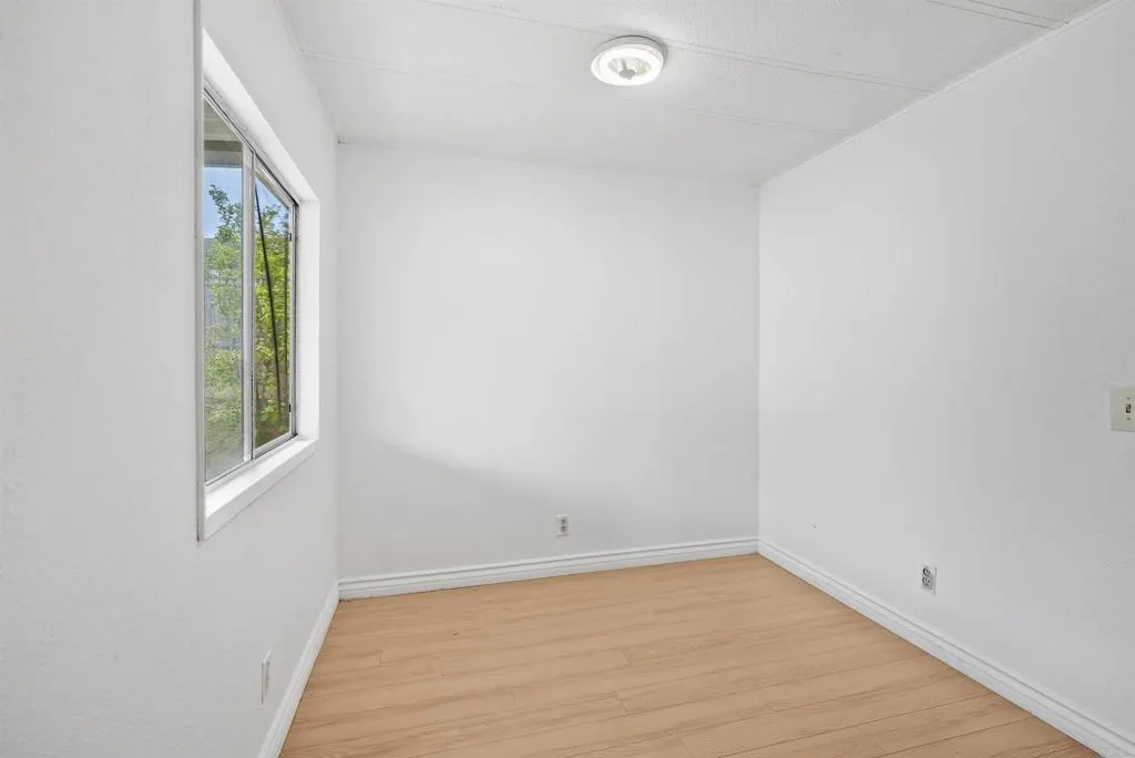 1455 Alturas Street, Unit 41 Fallbrook, CA 92028 - Photo 35 of 52 an empty room with a window