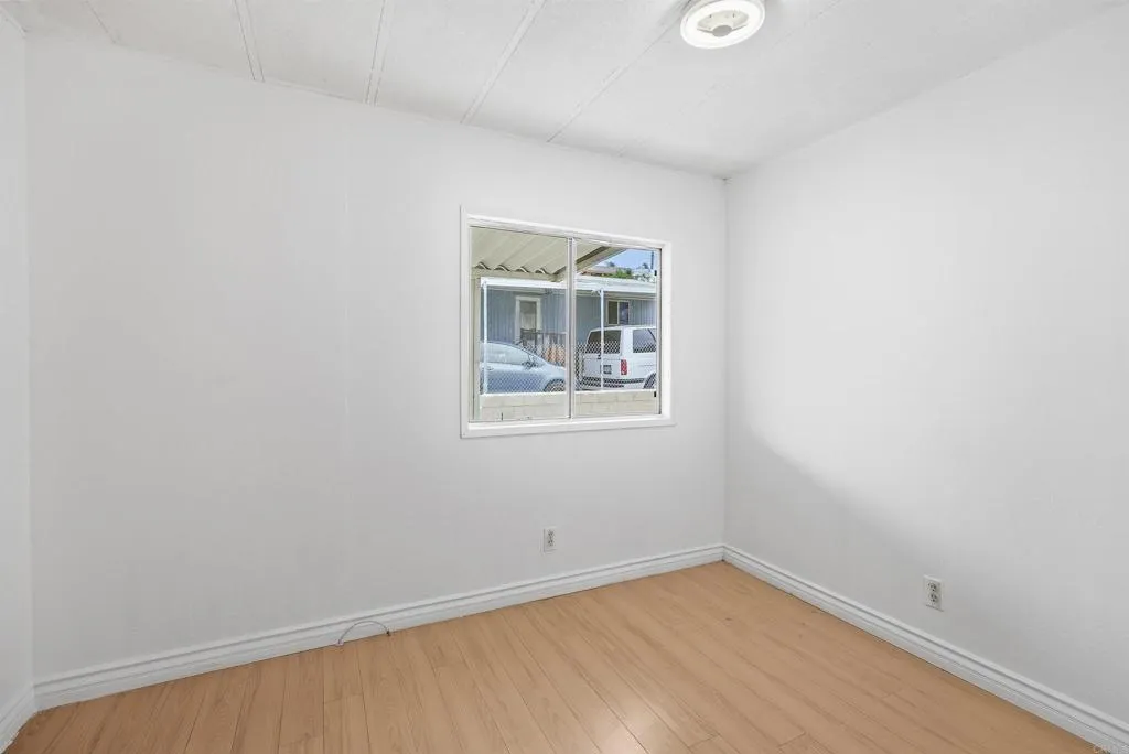 1455 Alturas Street, Unit 41 Fallbrook, CA 92028 - Photo 36 of 52 an empty room with a window