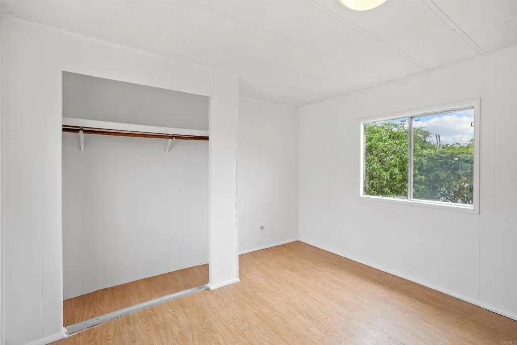 1455 Alturas Street, Unit 41 Fallbrook, CA 92028 - Photo 37 of 52 an empty room with a window