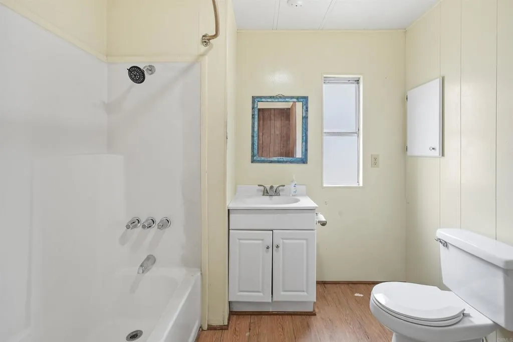 1455 Alturas Street, Unit 41 Fallbrook, CA 92028 - Photo 39 of 52 a bathroom with a sink a toilet and shower