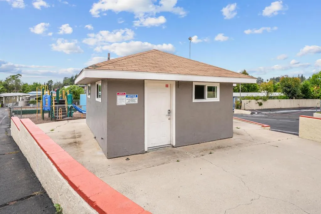 1455 Alturas Street, Unit 41 Fallbrook, CA 92028 - Photo 49 of 52 a front view of a house with a yard
