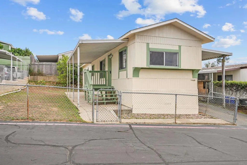 1455 Alturas Street, Unit 41 Fallbrook, CA 92028 - Photo 51 of 52 a view of a white house