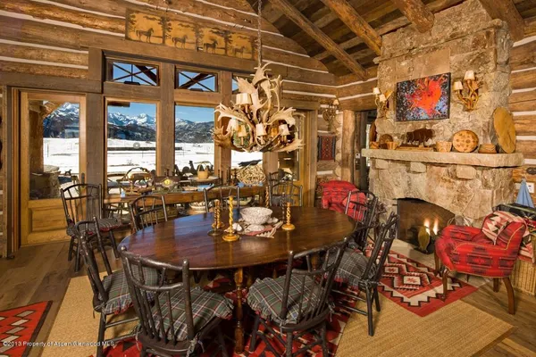a open kitchen with stainless steel appliances granite countertop a stove and a refrigerator