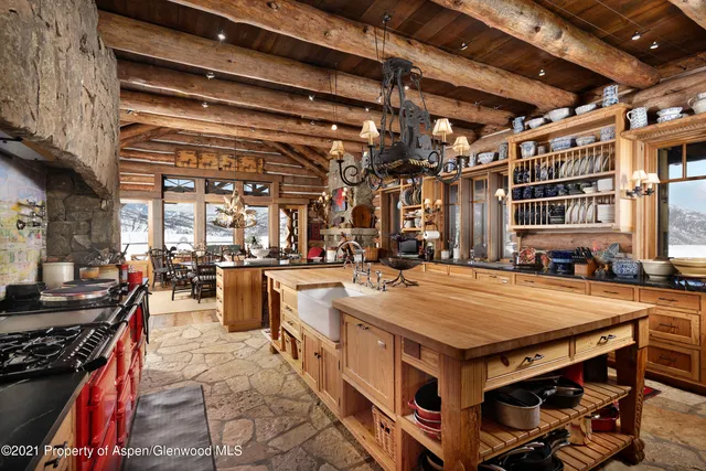 a dining room with large window