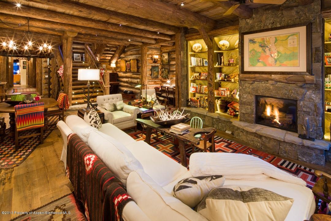 1100 McLain Flats Road Aspen, CO 81612 - Photo 17 of 50 a living room with furniture and a fireplace