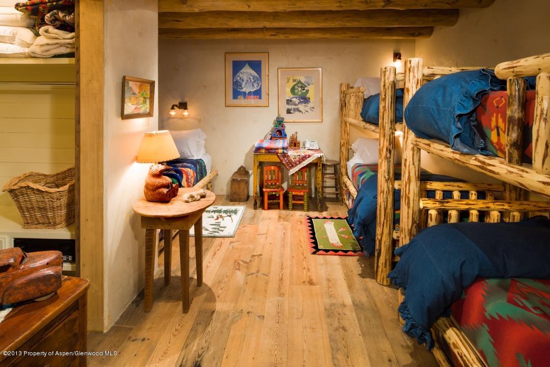 1100 McLain Flats Road Aspen, CO 81612 - Photo 18 of 50 a view of a dining room with furniture and wooden floor