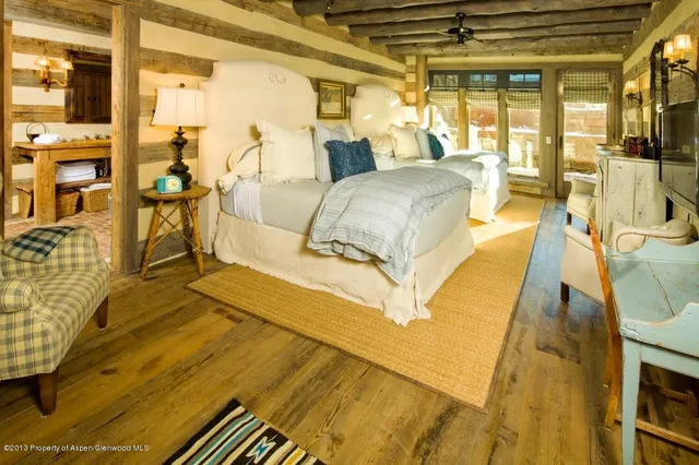 a view of a bathroom with a sink and mirror