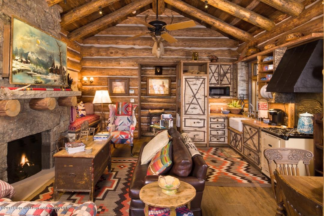 1100 McLain Flats Road Aspen, CO 81612 - Photo 32 of 50 a view of a chairs and tables in a patio