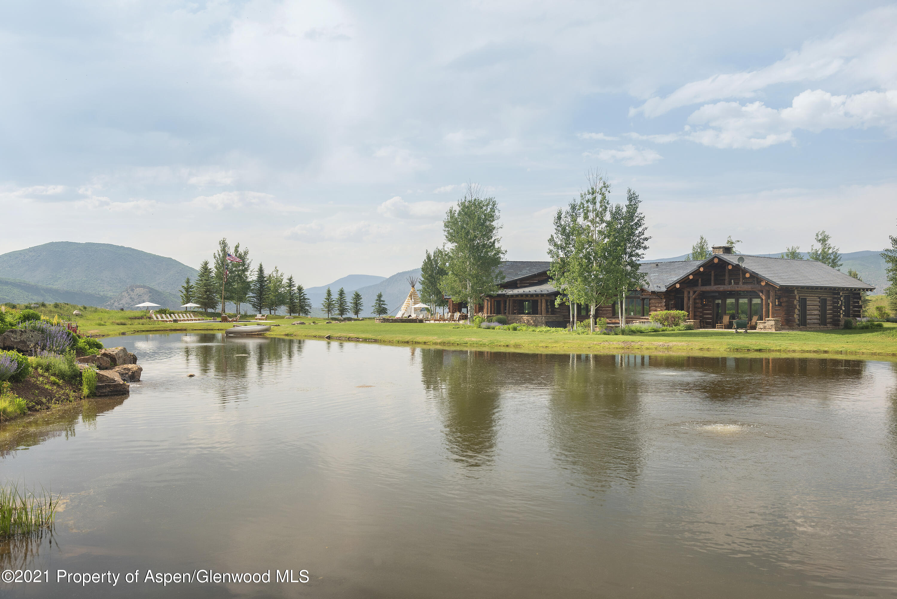 1100 McLain Flats Road Aspen, CO 81612 - Photo 36 of 50 a view of a lake with houses in the back