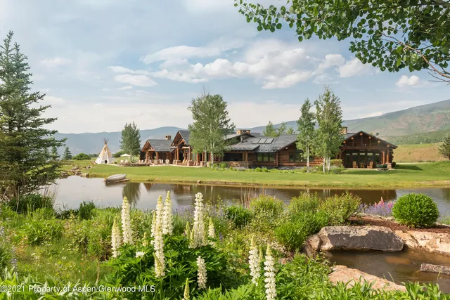 a view of a swimming pool with a lounge chairs