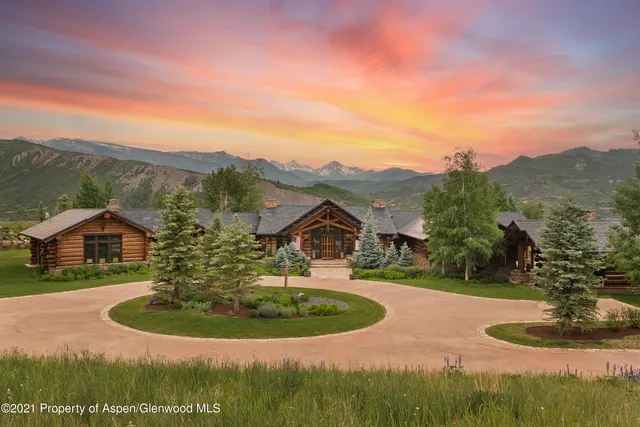 a view of a swimming pool with a lounge chairs