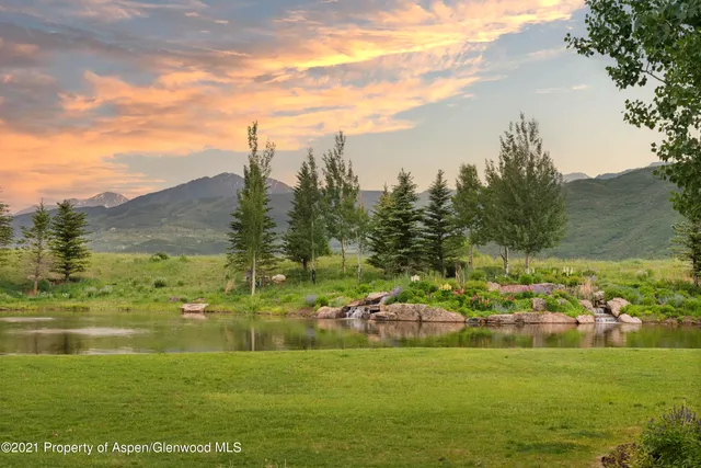 a view of a town with an ocean