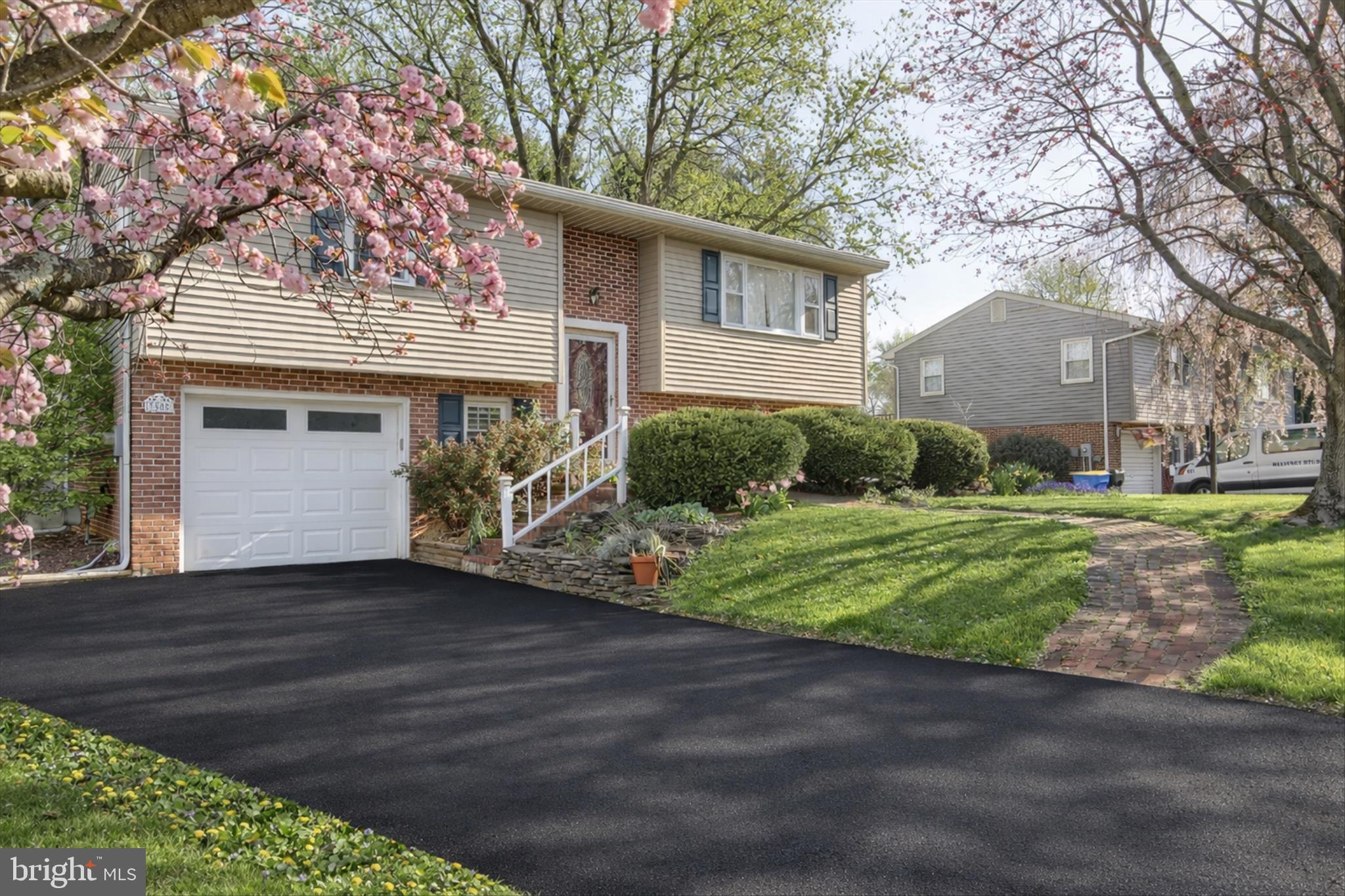 3505 Cranmere Lane York, PA 17402 - Photo 2 of 33 a front view of a house with garden