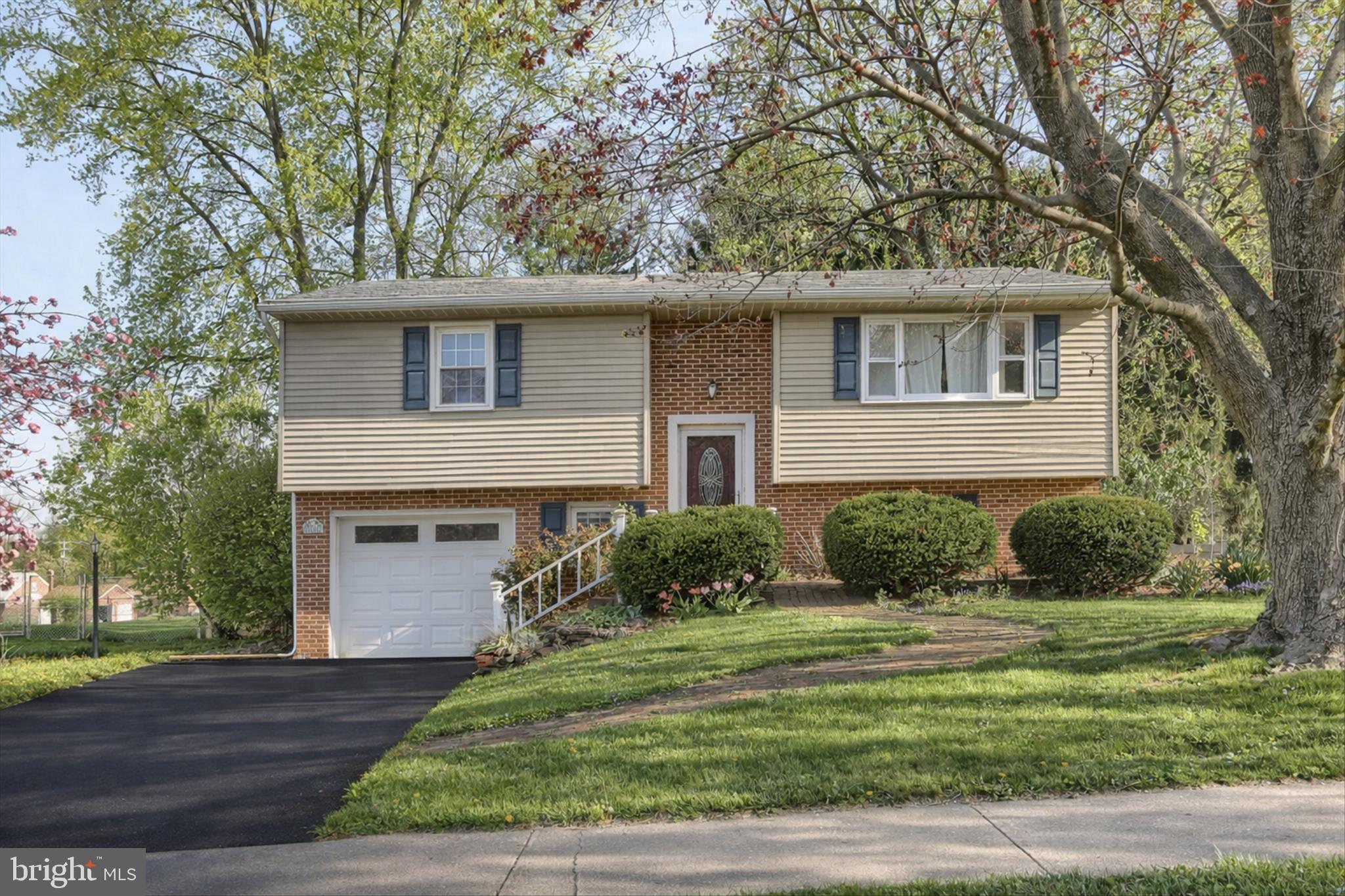 3505 Cranmere Lane York, PA 17402 - Photo 3 of 33 a front view of a house with a yard