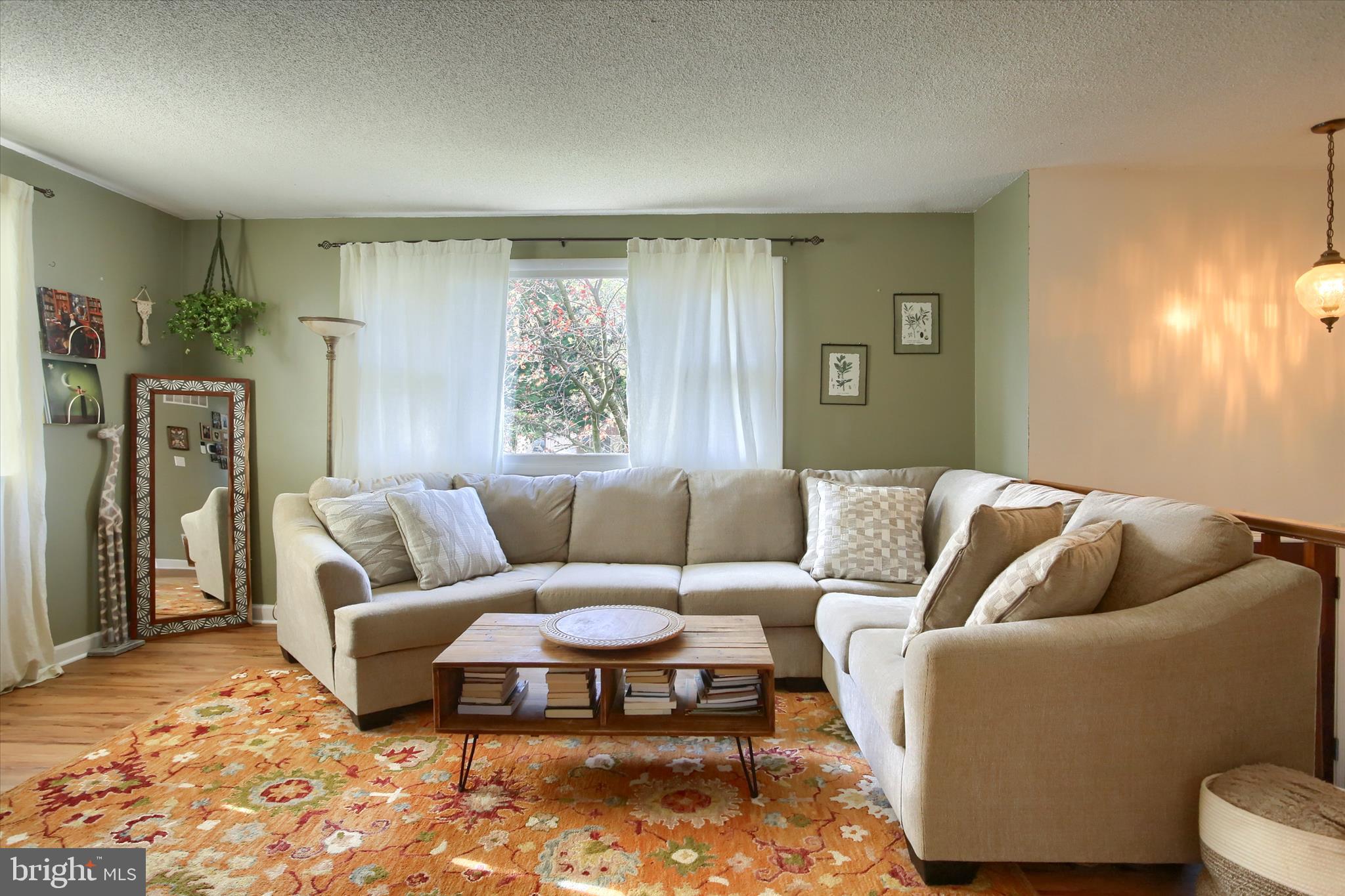 3505 Cranmere Lane York, PA 17402 - Photo 7 of 33 a living room with furniture and a large window