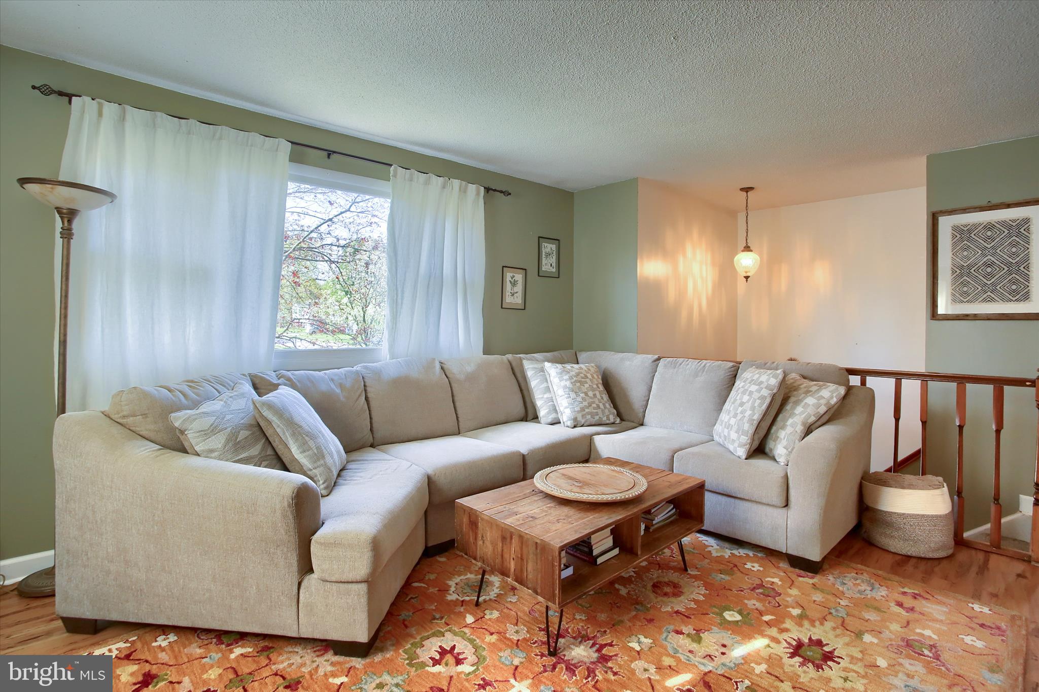 3505 Cranmere Lane York, PA 17402 - Photo 8 of 33 a living room with furniture and a large window