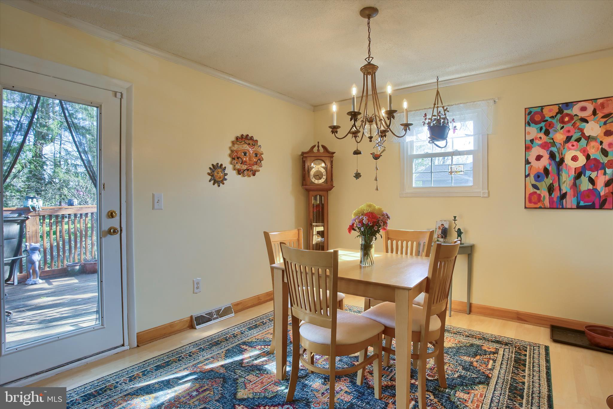3505 Cranmere Lane York, PA 17402 - Photo 10 of 33 a view of a dining room with furniture wooden floor and a chandelier