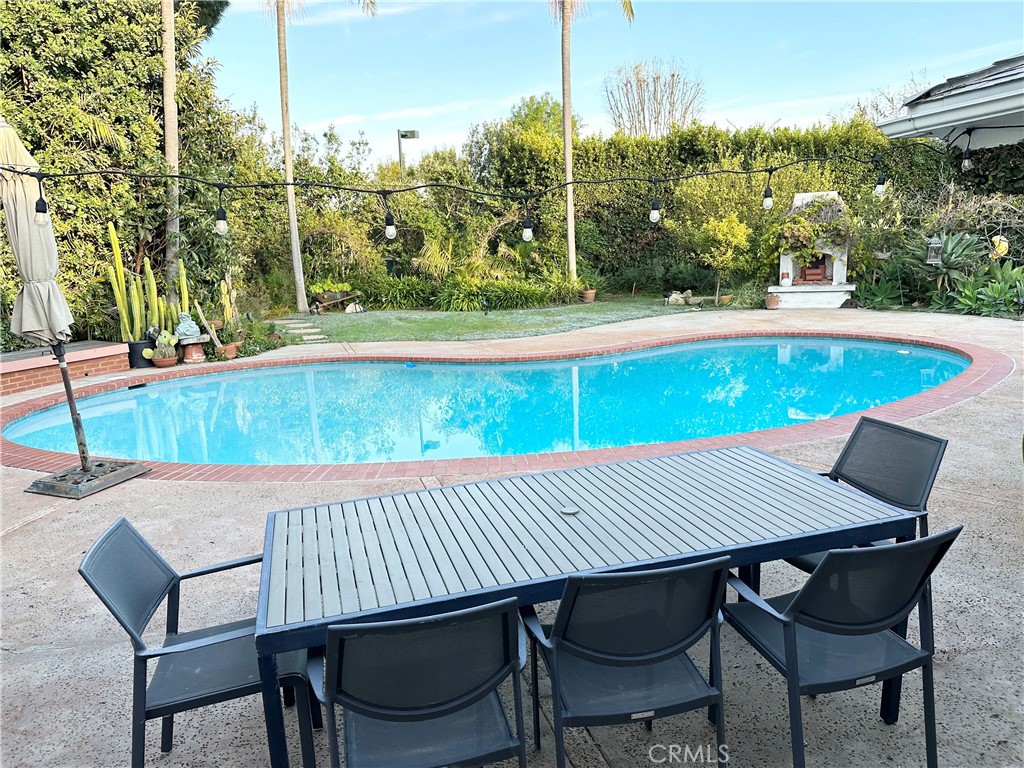 27424 Rainbow Ridge Road Palos Verdes Peninsula, CA 90274 - Photo 20 of 47 a view of a table and chairs in patio
