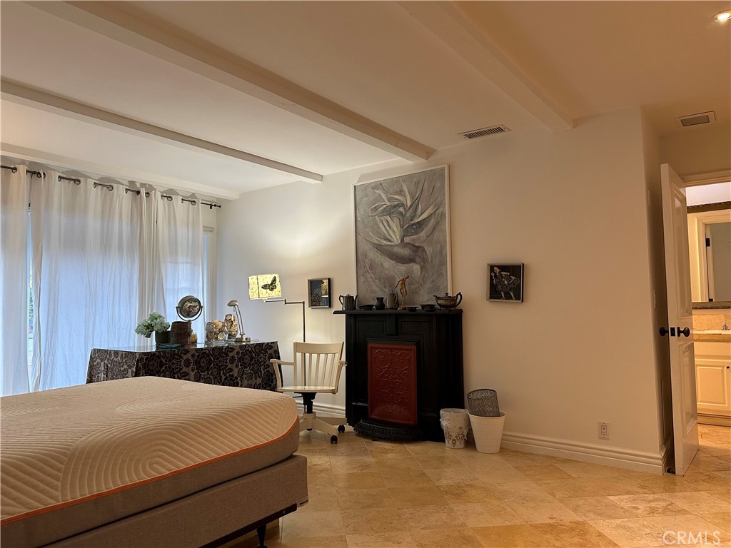 27424 Rainbow Ridge Road Palos Verdes Peninsula, CA 90274 - Photo 34 of 47 a bedroom with a bed and a dresser